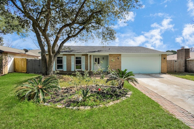 single story home featuring brick siding, fence, a garage, a front yard, and concrete driveway
