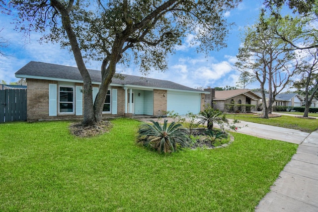 ranch-style house with a garage, brick siding, fence, and concrete driveway
