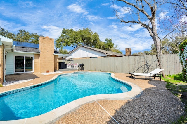 view of pool featuring a fenced backyard, a patio, and a fenced in pool