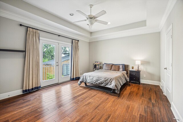 bedroom with baseboards, access to exterior, french doors, and wood finished floors