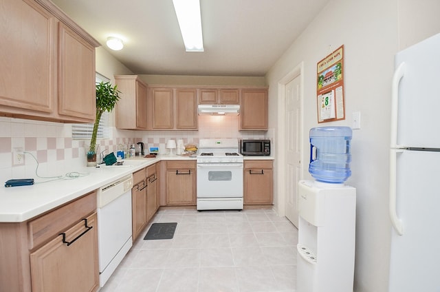 7011 Westover Ridge Dr, Houston, TX 77072 - kitchen featuring light brown cabinetry, tasteful backsplash, under cabinet range hood, and white appliances