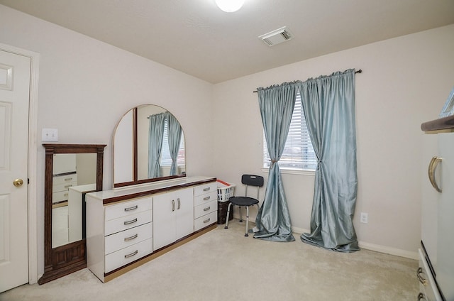 7011 Westover Ridge Dr, Houston, TX 77072 - bedroom featuring visible vents, light carpet, and multiple windows