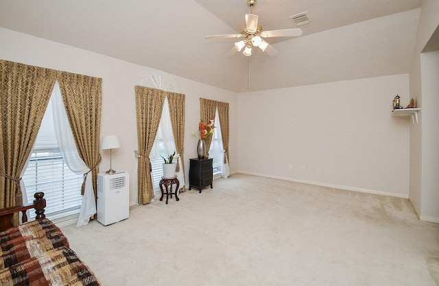 7011 Westover Ridge Dr, Houston, TX 77072 - sitting room with visible vents, a ceiling fan, carpet floors, and lofted ceiling
