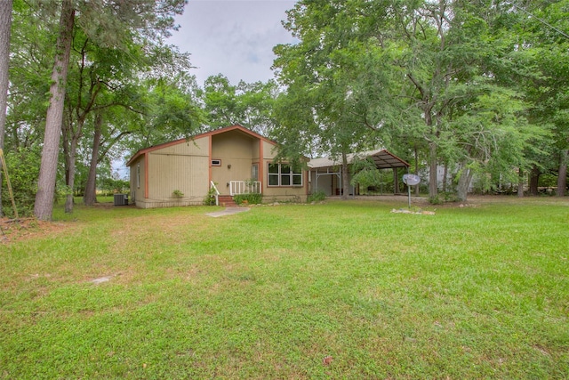 81 Westlake Rd, Trinity, TX 75862 - view of grassy yard with a carport and cooling unit
