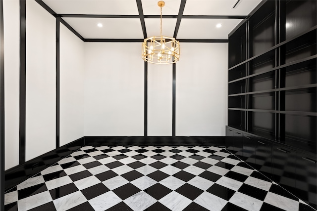 empty room featuring recessed lighting, ornamental molding, baseboards, and a chandelier