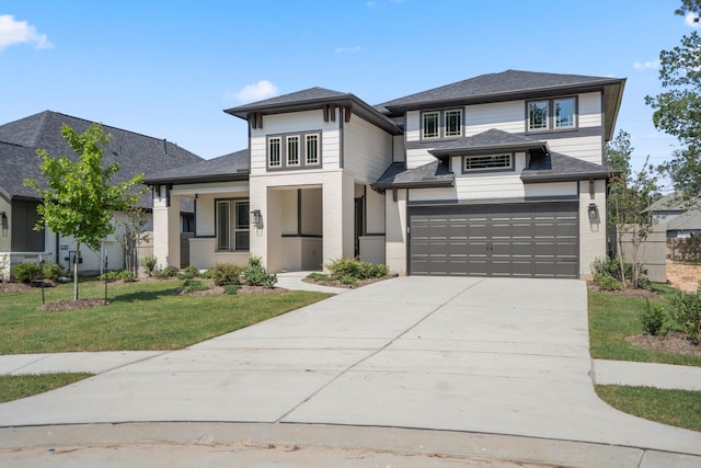 17335 Sunflower Petals Trl, Conroe, TX 77302 - prairie-style house featuring a front yard, driveway, a garage, and brick siding