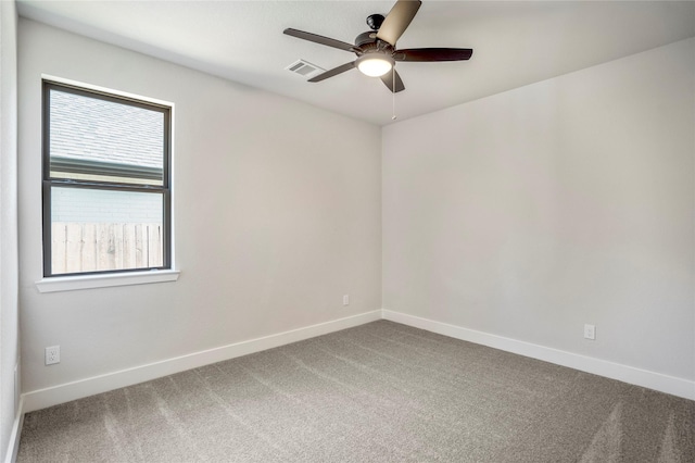 17335 Sunflower Petals Trl, Conroe, TX 77302 - carpeted spare room with baseboards, visible vents, and a ceiling fan