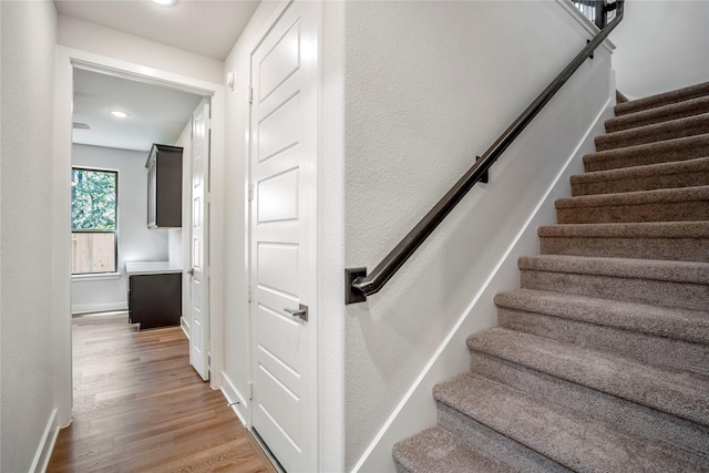 17335 Sunflower Petals Trl, Conroe, TX 77302 - staircase with baseboards, recessed lighting, and wood finished floors