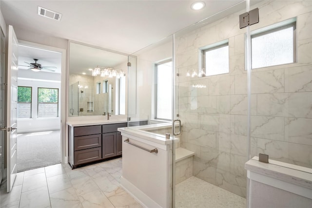 17335 Sunflower Petals Trl, Conroe, TX 77302 - bathroom featuring recessed lighting, a shower stall, vanity, a ceiling fan, and visible vents