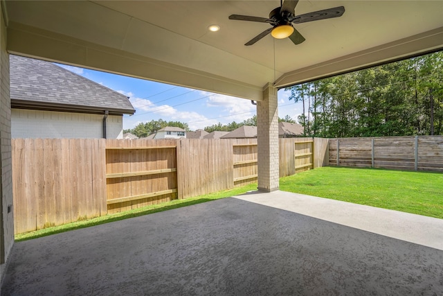 17335 Sunflower Petals Trl, Conroe, TX 77302 - view of patio / terrace featuring a fenced backyard and a ceiling fan