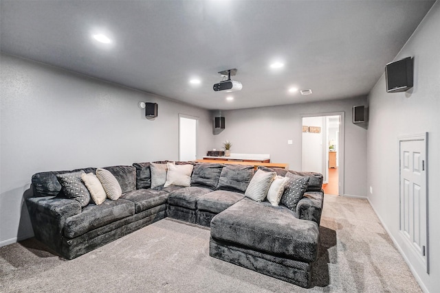 living room featuring recessed lighting, visible vents, light colored carpet, and baseboards