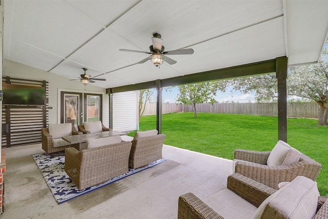 view of patio / terrace featuring an outdoor living space, a ceiling fan, and a fenced backyard