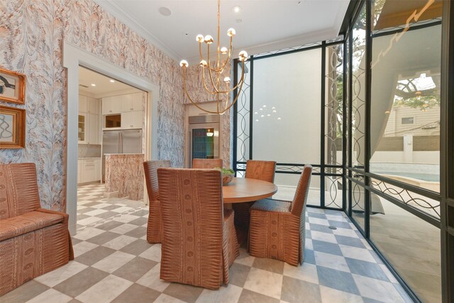 1069 Kirby Dr, Houston, TX 77019 - dining area featuring tile patterned floors, ornamental molding, and a notable chandelier