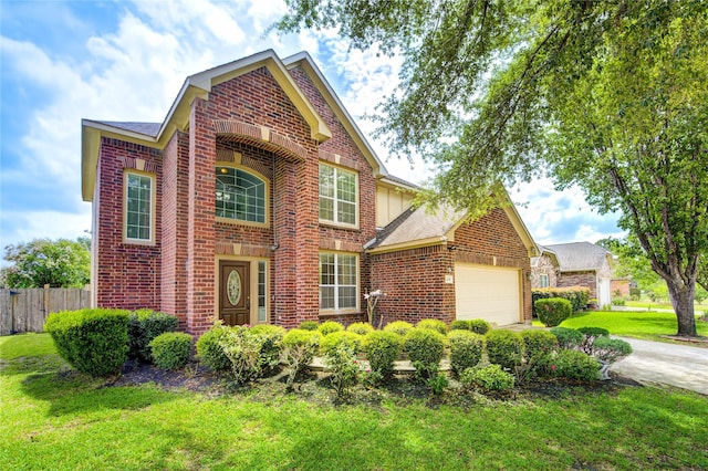 12430 Heritage Grove Dr, Houston, TX 77066 - traditional home with brick siding, fence, and a garage
