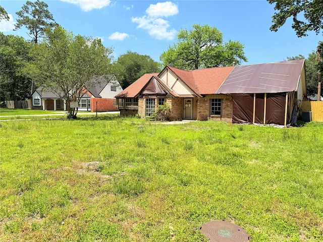 view of front of home featuring brick siding