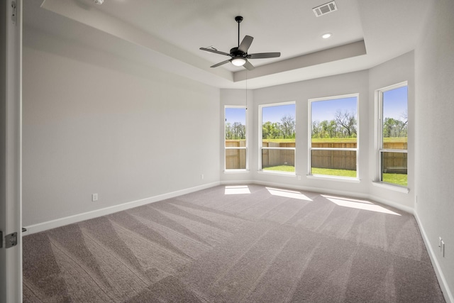 9722 Leafgate Ct, Missouri City, TX 77459 - carpeted empty room with recessed lighting, baseboards, visible vents, a raised ceiling, and a ceiling fan