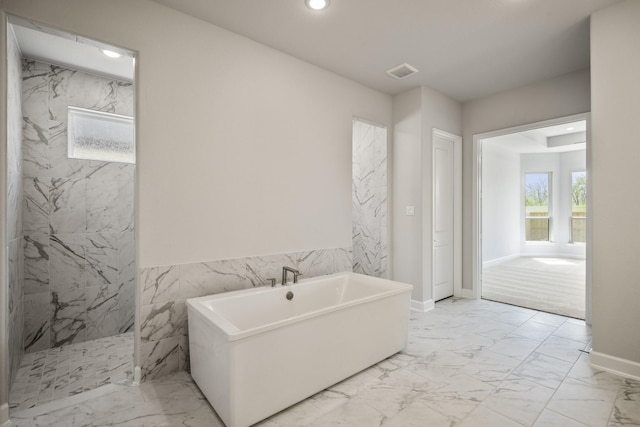 9722 Leafgate Ct, Missouri City, TX 77459 - bathroom with recessed lighting, a marble finish shower, marble finish floor, visible vents, and a soaking tub