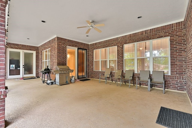 310 Rustic Ln, Friendswood, TX 77546 - view of patio / terrace with a ceiling fan and area for grilling