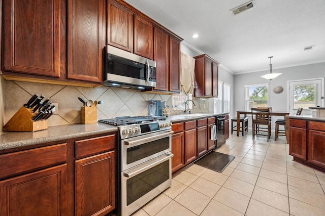 8522 E Highlands Xing, Highlands, TX 77562 - kitchen featuring a sink, stainless steel appliances, decorative backsplash, crown molding, and visible vents