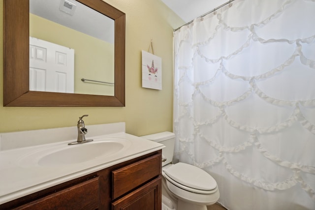 8522 E Highlands Xing, Highlands, TX 77562 - full bath with visible vents, toilet, a shower with curtain, and vanity