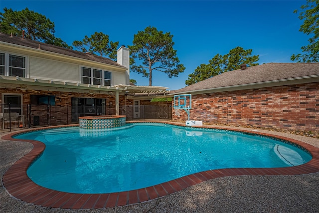 17022 Shadow Valley Dr, Spring, TX 77379 - view of pool with a pergola, a pool with connected hot tub, and fence