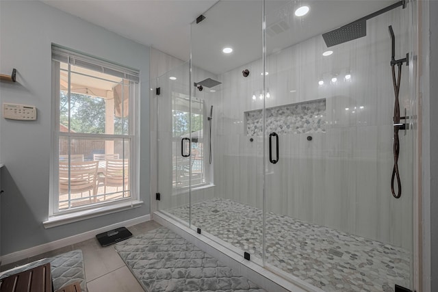 17022 Shadow Valley Dr, Spring, TX 77379 - bathroom with a stall shower, baseboards, recessed lighting, and tile patterned floors