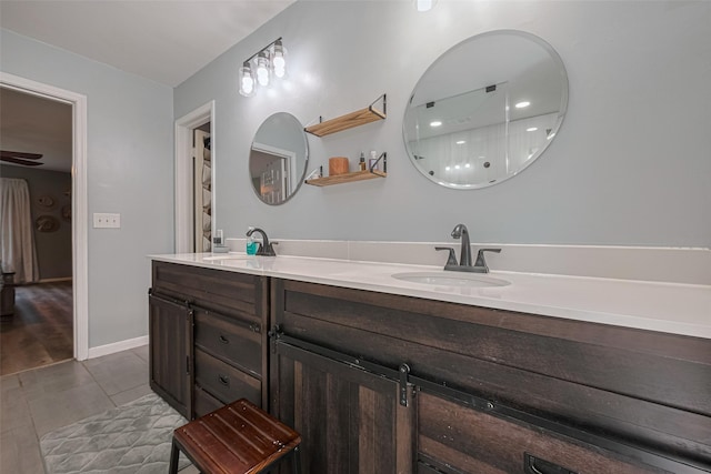 17022 Shadow Valley Dr, Spring, TX 77379 - full bathroom with double vanity and tile patterned flooring
