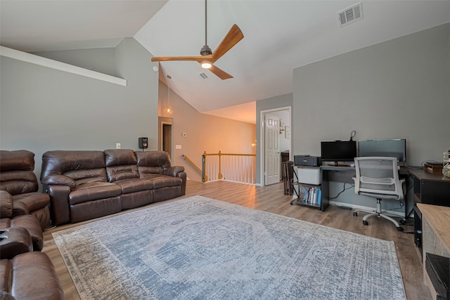 17022 Shadow Valley Dr, Spring, TX 77379 - living area featuring wood finished floors, ceiling fan, an office area, and high vaulted ceiling