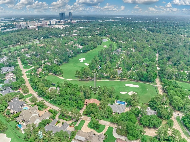 birds eye view of property with golf course view