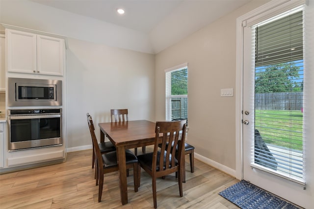 2379 Woodland Prairie Ln, Conroe, TX 77384 - dining area with light wood-style floors, baseboards, and recessed lighting