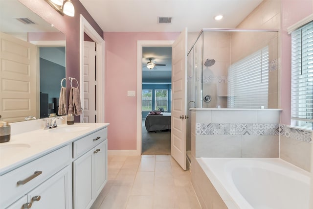 2379 Woodland Prairie Ln, Conroe, TX 77384 - ensuite bathroom with connected bathroom, a ceiling fan, visible vents, and a stall shower