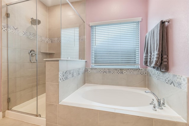 2379 Woodland Prairie Ln, Conroe, TX 77384 - bathroom with a shower stall and a garden tub