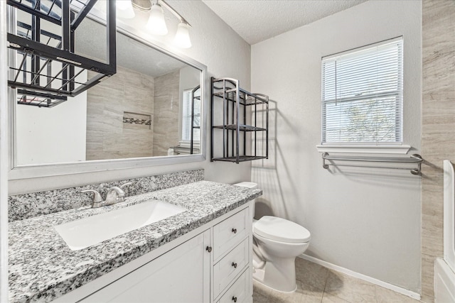 full bathroom with tile patterned floors, toilet, vanity, a textured ceiling, and a shower