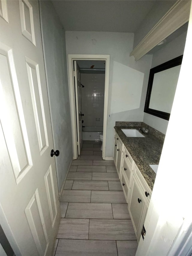 22006 Joshua Kendell Ln, Katy, TX 77449 - bathroom featuring double vanity and washtub / shower combination