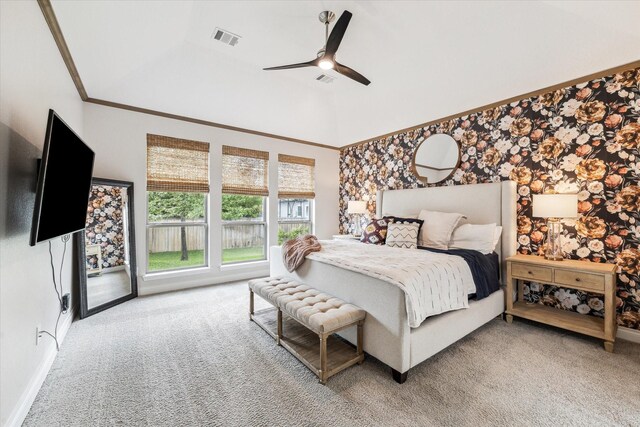 bedroom with crown molding, light colored carpet, baseboards, and visible vents