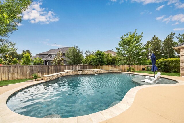 view of pool featuring a fenced in pool and a fenced backyard