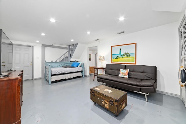 bedroom featuring recessed lighting, visible vents, finished concrete flooring, and baseboards