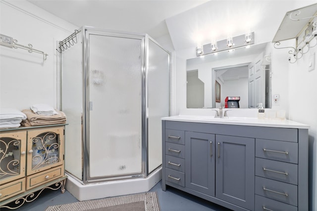full bath with vanity and a stall shower