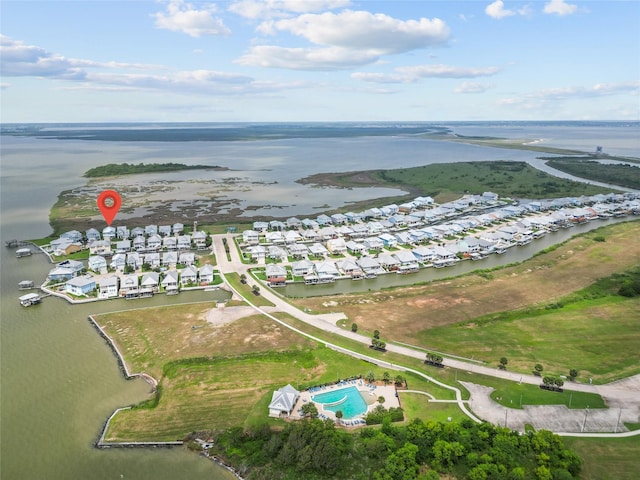 birds eye view of property featuring a residential view and a water view