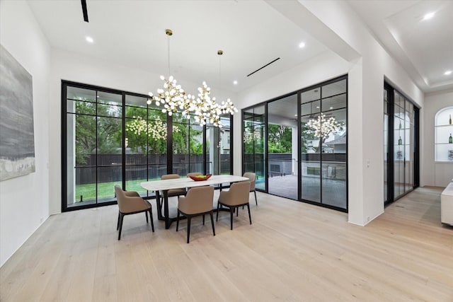 4530 Birch, Bellaire, TX 77401 - dining area featuring a chandelier, light wood-style floors, and recessed lighting