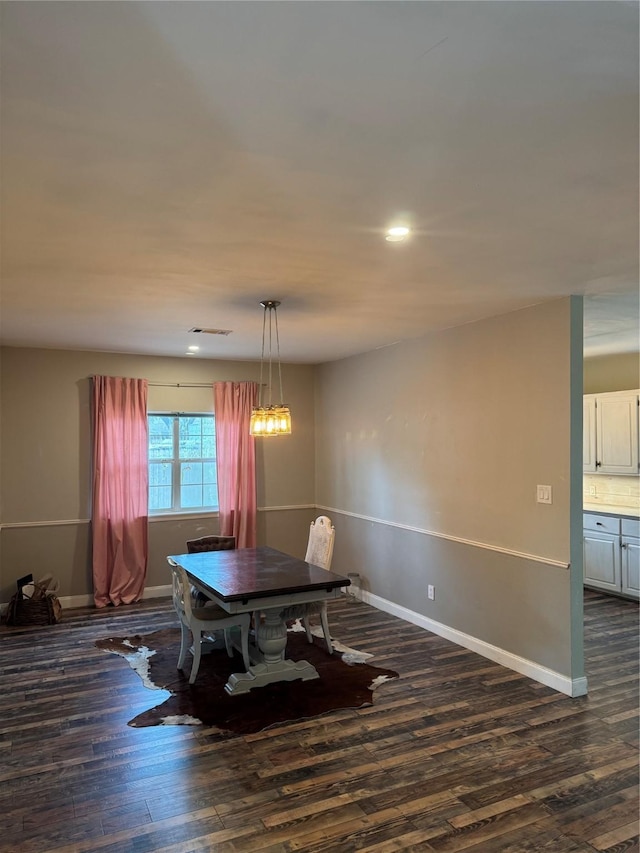 dining room featuring recessed lighting, baseboards, dark wood-style floors, and visible vents