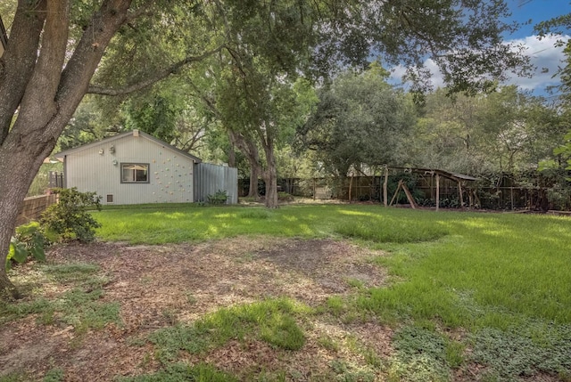 9010 Carousel Ln, Houston, TX 77080 - fenced backyard with view of wooded area