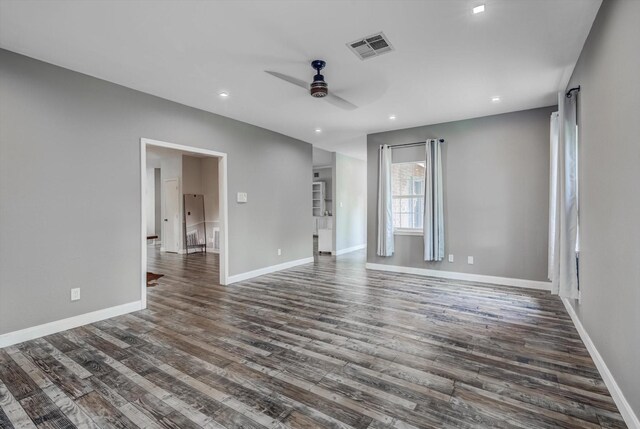 9010 Carousel Ln, Houston, TX 77080 - unfurnished room featuring a ceiling fan, dark wood-type flooring, and recessed lighting