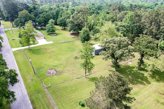 aerial view with a rural view and a wooded view