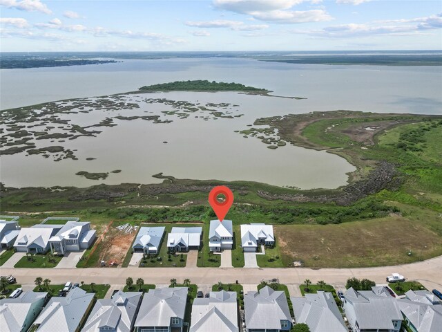 aerial view with a water view and a residential view