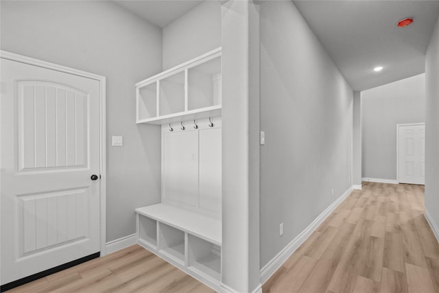 mudroom with baseboards, light wood-type flooring, and recessed lighting