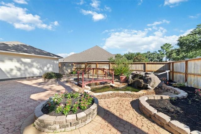 view of yard featuring a fenced backyard and a patio area