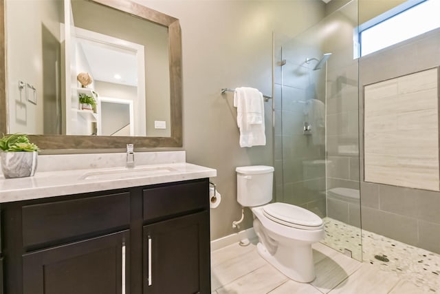 1812 Bingham St, Houston, TX 77007 - bathroom with baseboards, walk in shower, toilet, tile patterned floors, and vanity