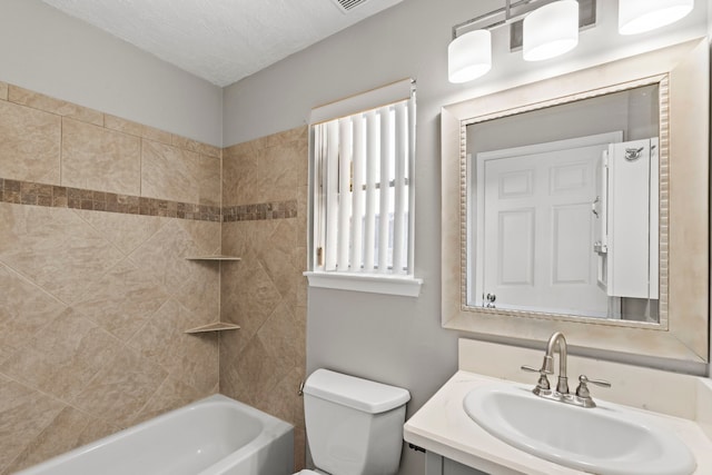 full bath with washtub / shower combination, vanity, and toilet