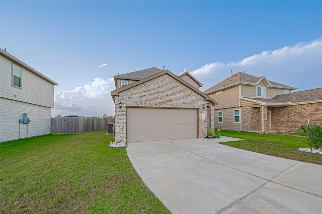 4807 Purple Wisteria Ln, Spring, TX 77373 - view of front facade with brick siding, concrete driveway, and a garage